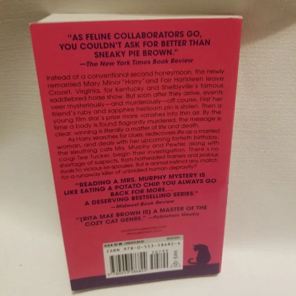 $6 if bundled- NWT Rita Mae Brown's Puss 'n Cahoots paperback - Picture 2 of 4